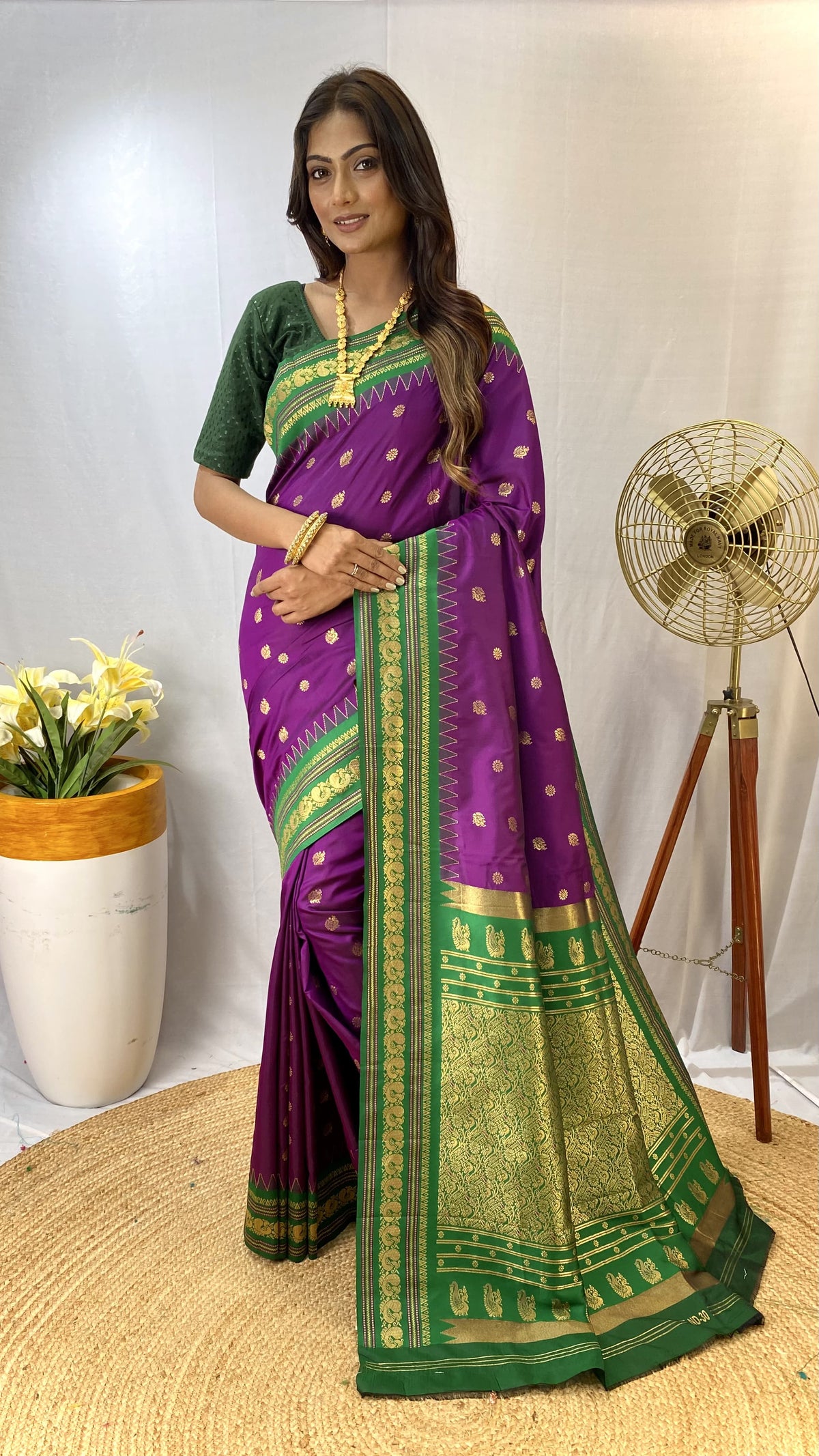 Paithani sarees with a peacock style contrast weaving border