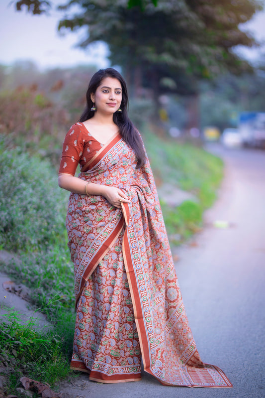 Soft Cotton Feel Saree with Ajrakh Prints & Zari Woven Border