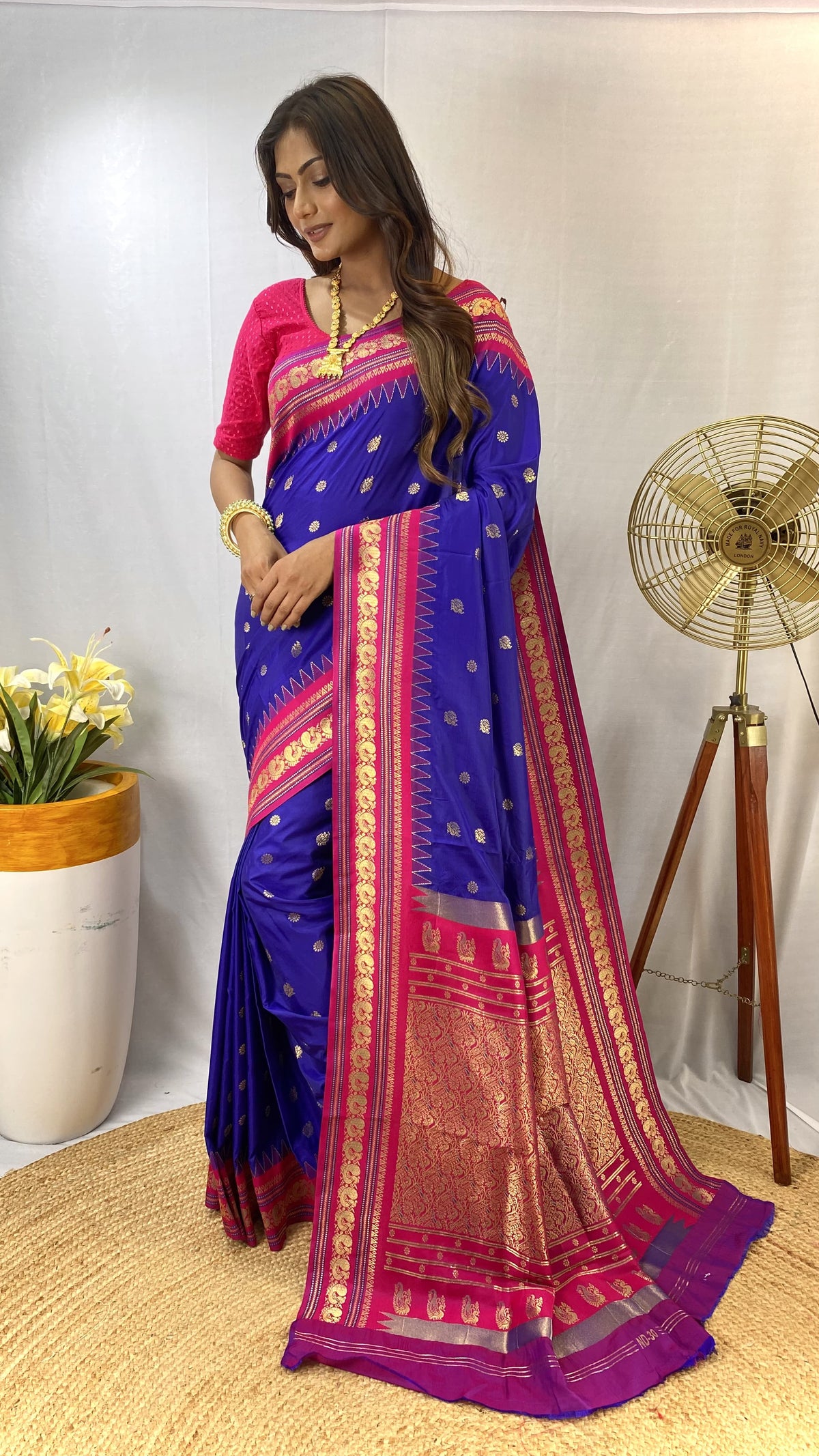 Paithani sarees with a peacock style contrast weaving border